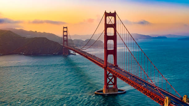 Golden Gate Bridge at sunset with the Marin headlands and the Pacific